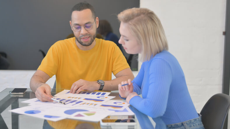 An AOLCC marketing coordinator student collaborating on a marketing project