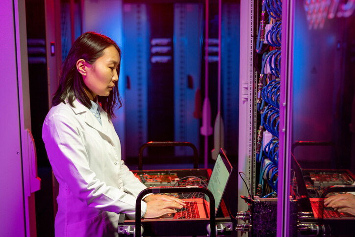 A Technician performing AI-powered diagnostics on a server